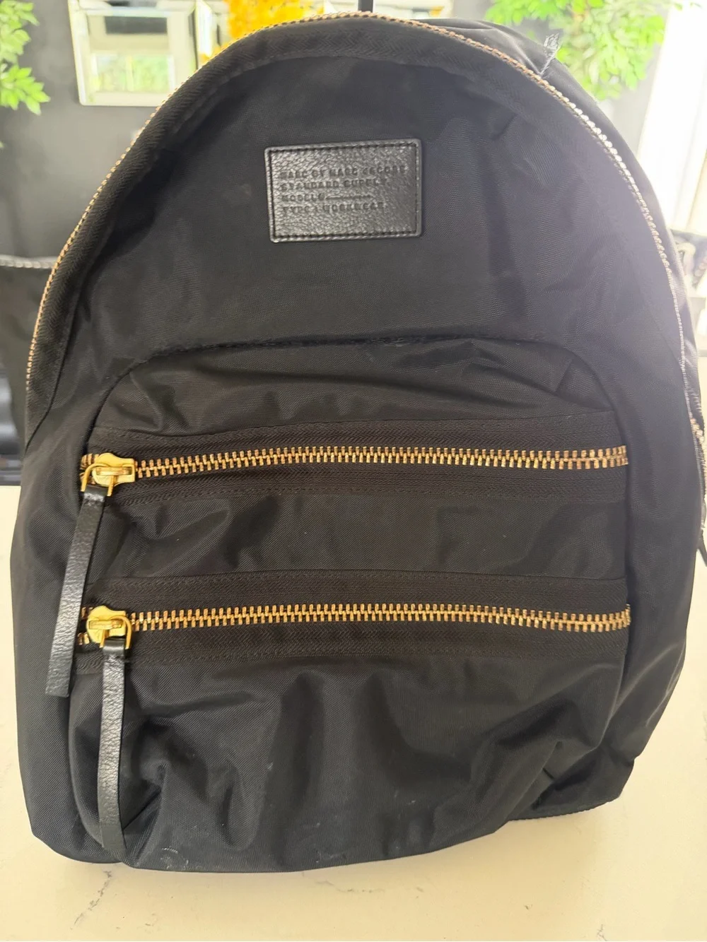 Marc Jacobs Black Backpack with Gold Zippers